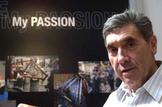 Merckx poses on the booth at the Bicycling Australia show