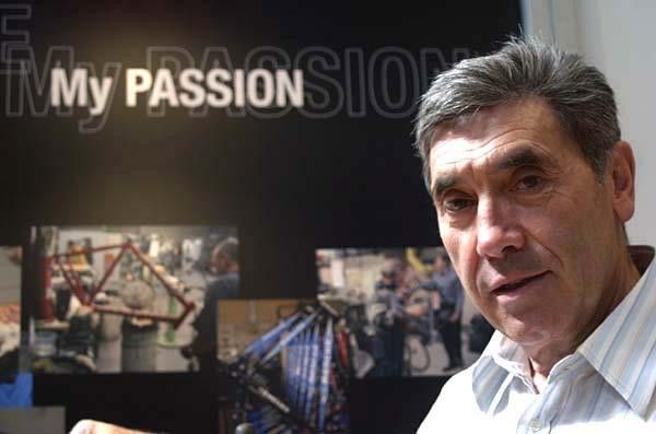Merckx poses on the booth at the Bicycling Australia show