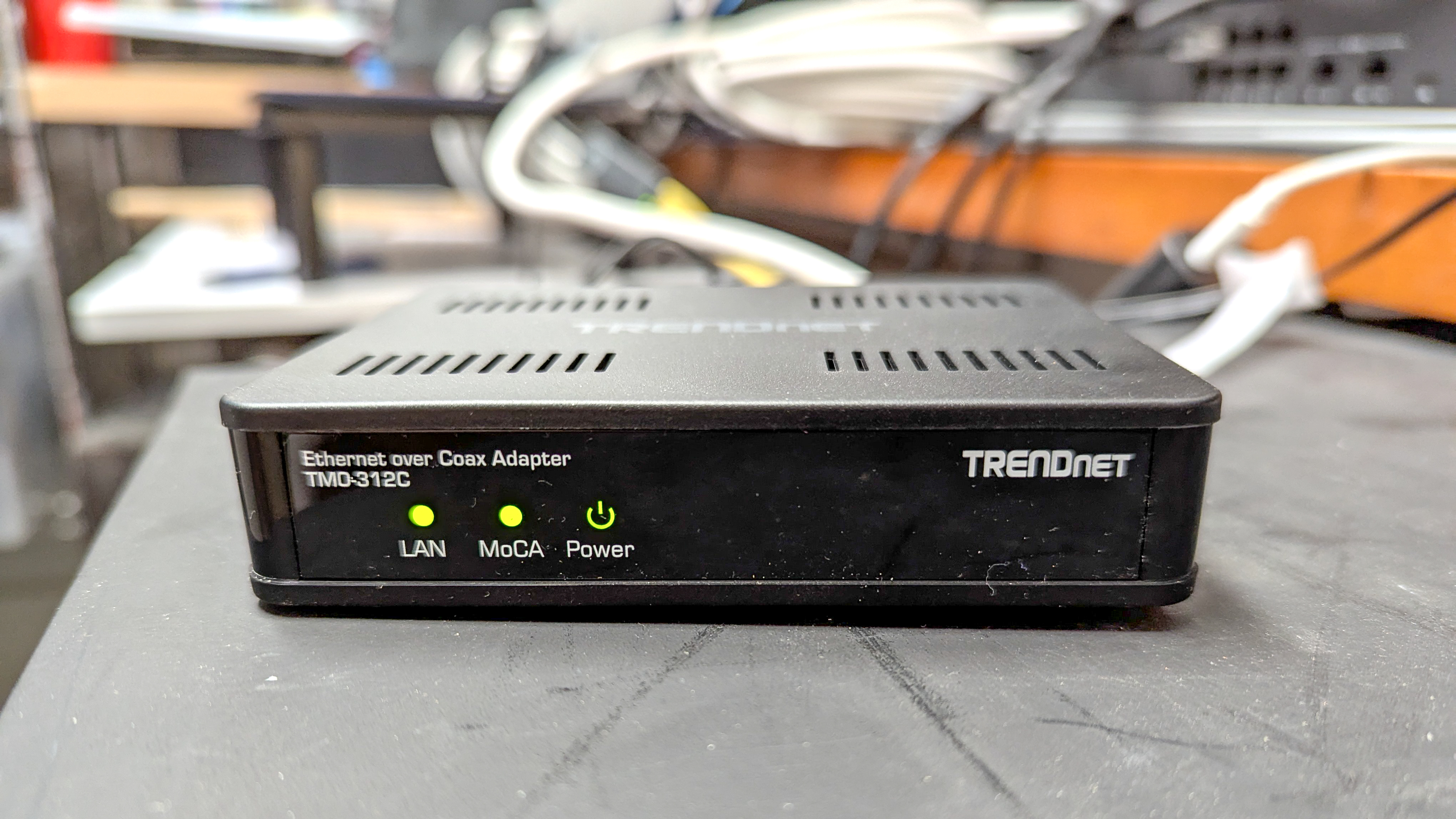 A trendnet moca adapter on an office