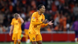 Virgil van Dijk of Netherlands claps to celebrate scoring in the build up to the Germany vs Netherlands 2024 Nations League game