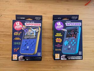 Super Pocket review; two boxed handheld consoles
