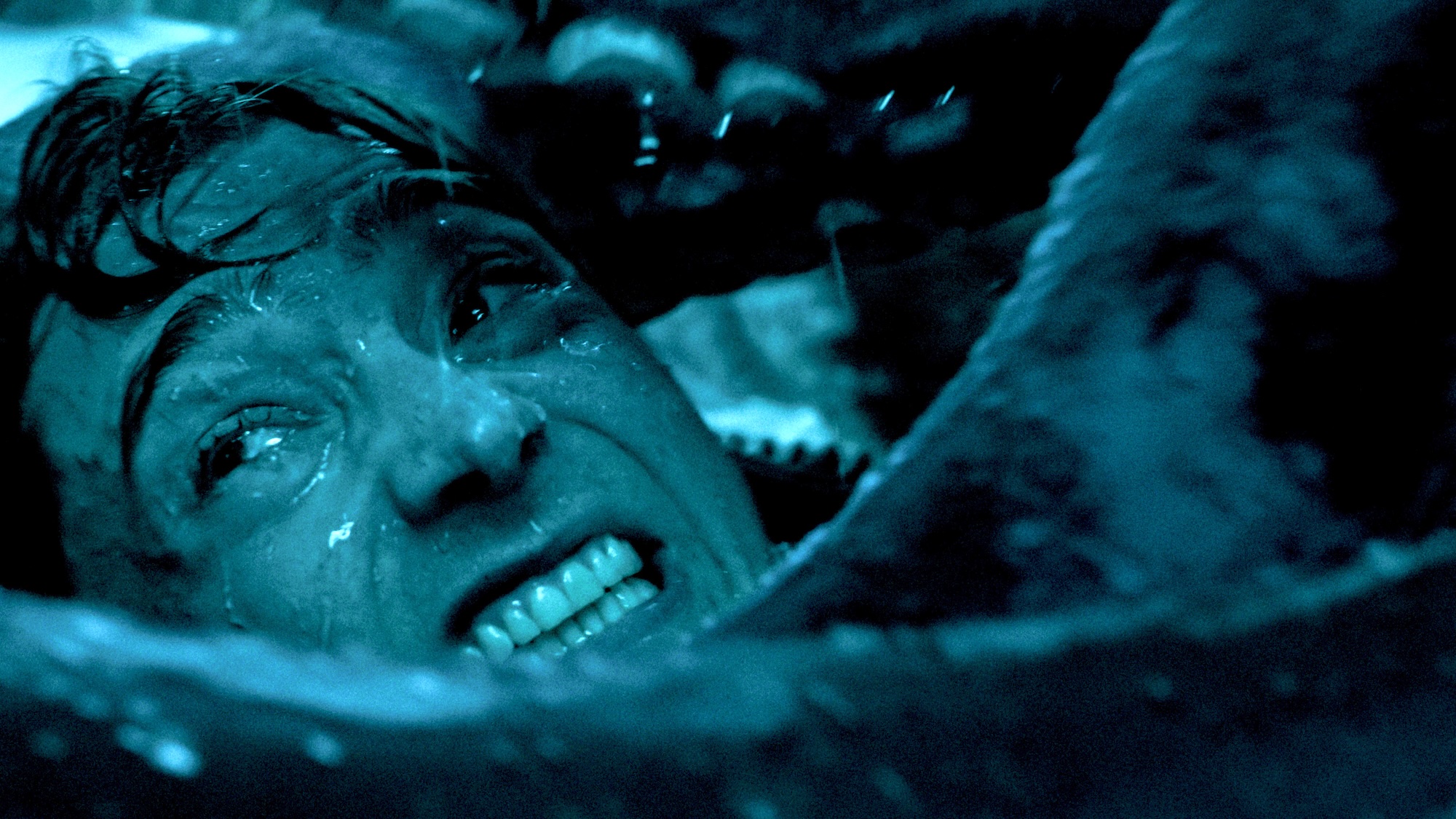 Austin Abrams looking distressed as he's swallowed by a whale in Whalefall