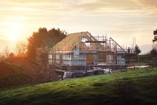 timber frame house under construction