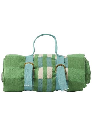 green picnic blanket with blue strap