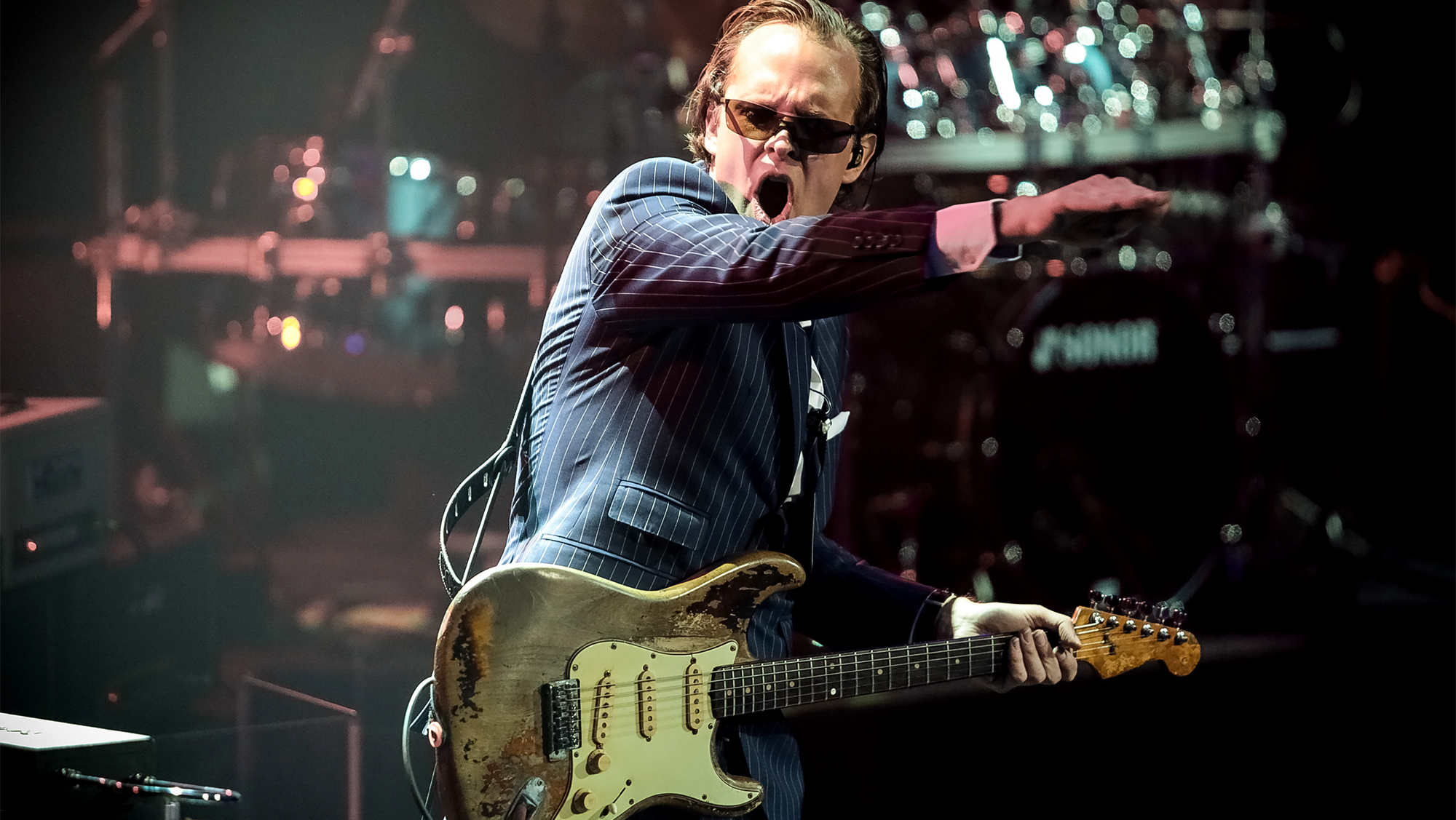 Joe Bonamassa performs on stage playing Rory Gallagher&#039;s guitar at the Royal Albert Hall on March 30, 2013 in London, England.