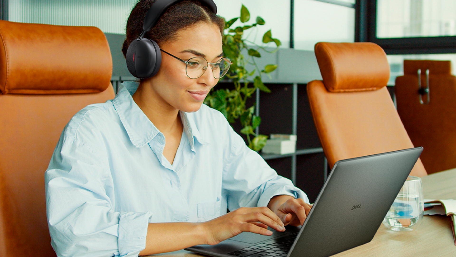 Dell Pro laptop being used by a person sat at a desk