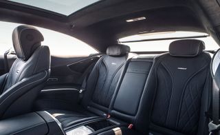 A view inside the car with black leather interior