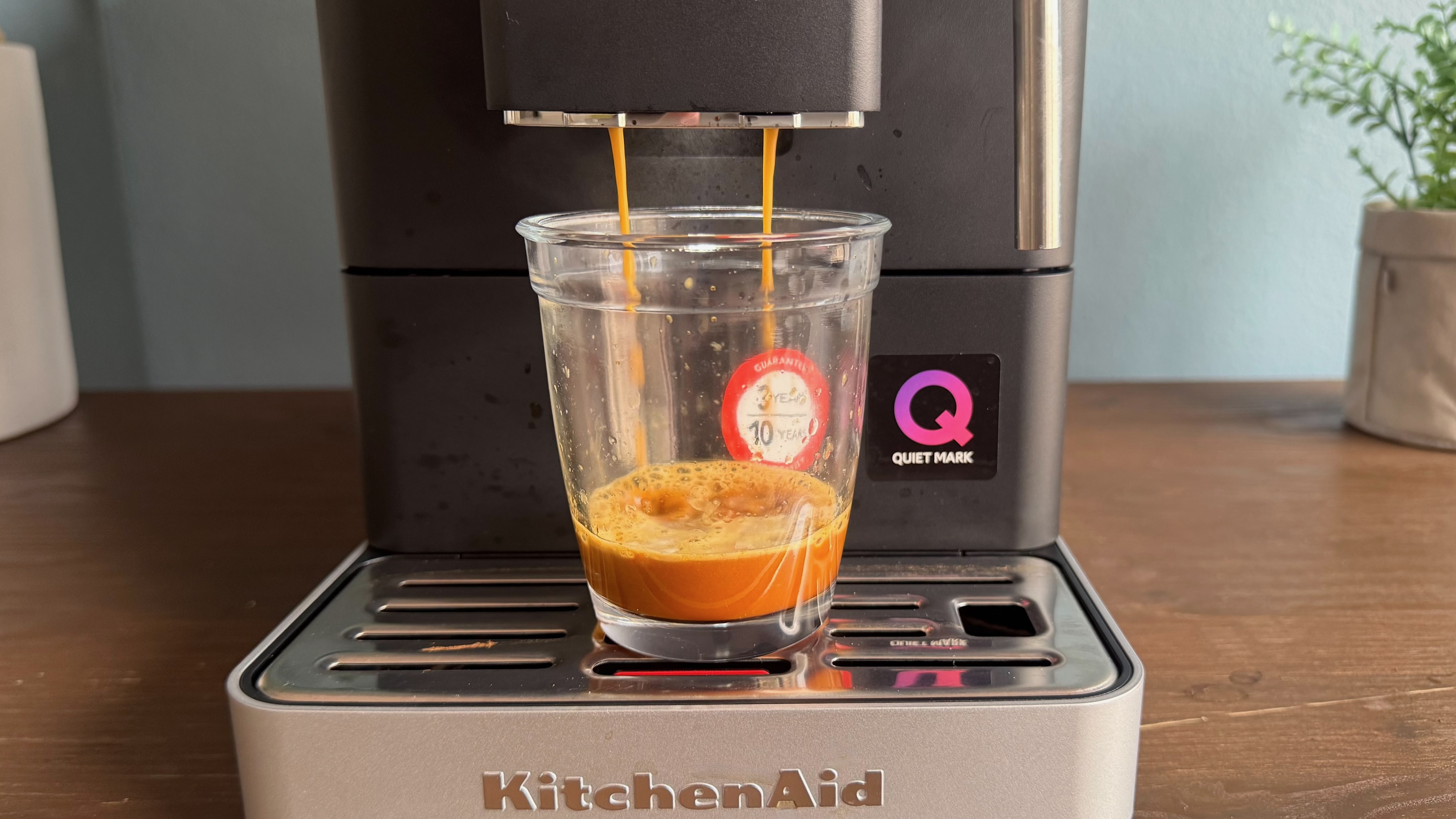 Coffee being poured from KitchenAid KF2