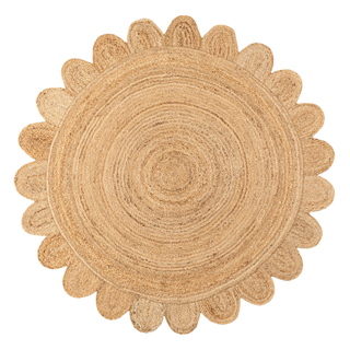 round jute rug with a scalloped edge