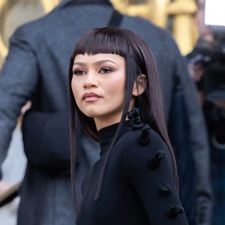 Zendaya wearing her micro bangs with long hair.