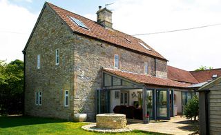 Stone extension to listed stone cottage