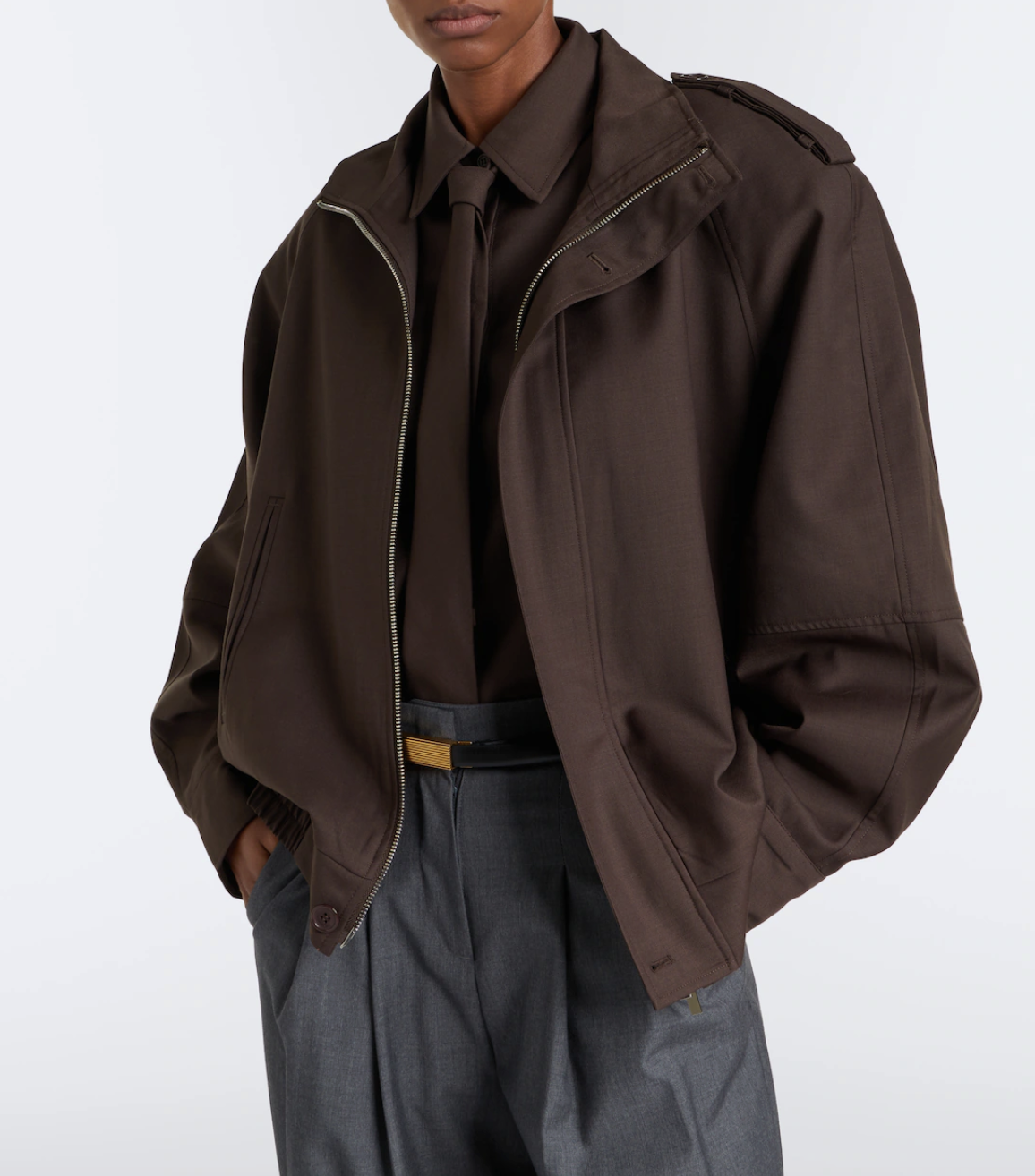 model wearing brown jacket