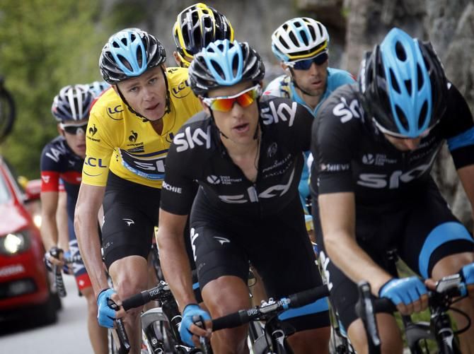 Team Sky take care of their race leader Chris Froome