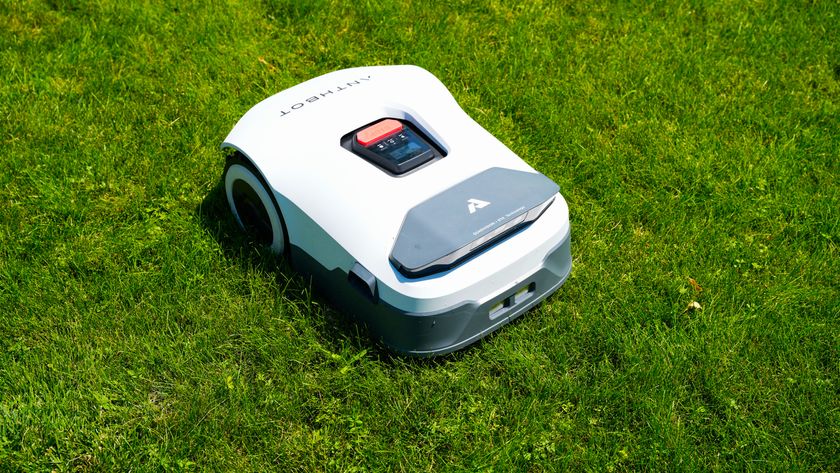 Anthbot Genie 3000 being tested in a bright green yard