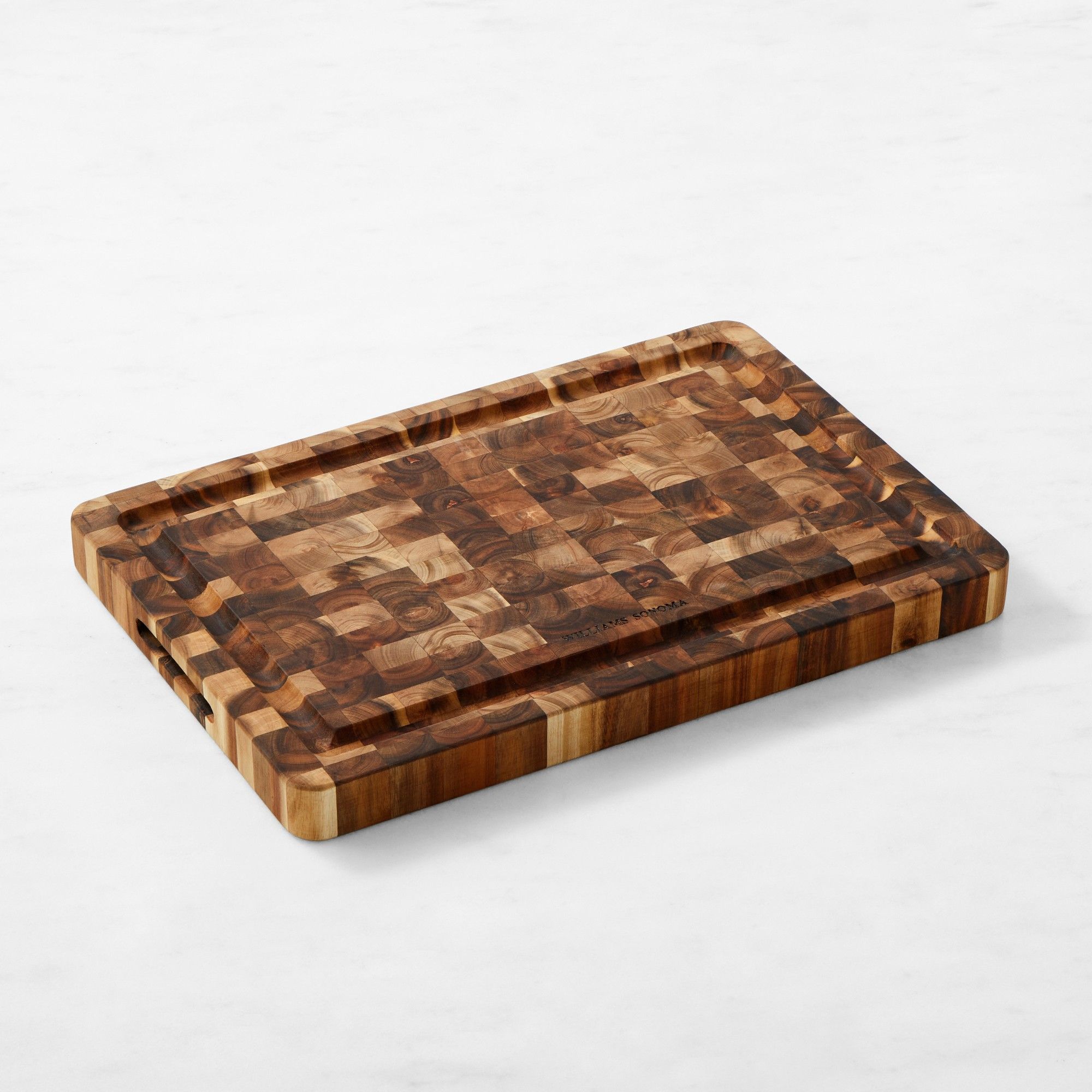 Acacia wood chopping board with checkerboard pattern