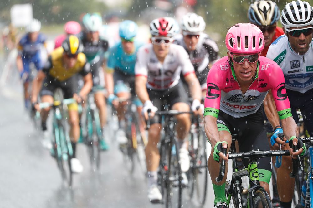 Rigoberto Uran rides in the rain during stage 11 at the Vuelta