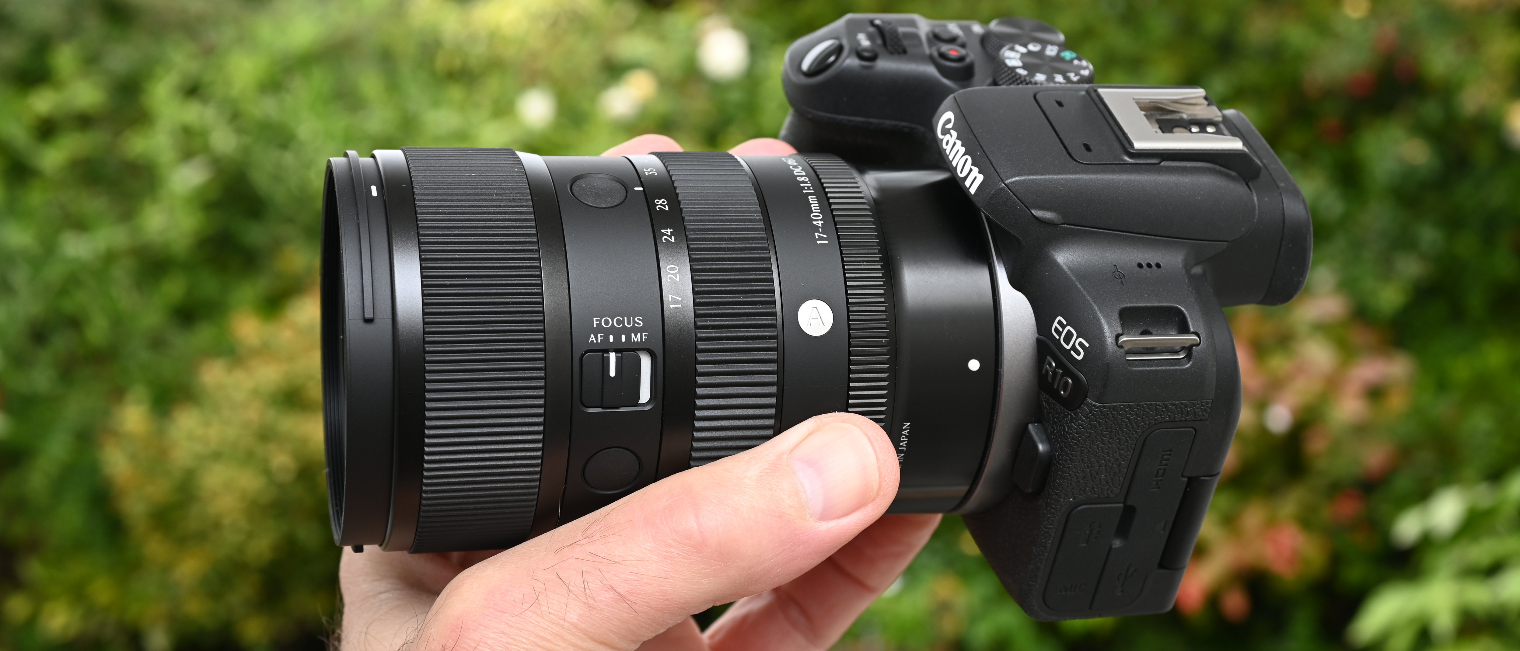 Sigma 17-40mm f/1.8 DC | A product shot held in hand