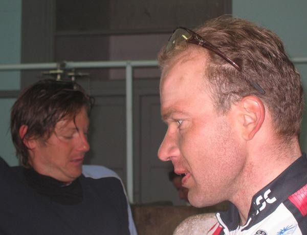 Lars Michaelsen (CSC) getting ready for a shower, Aart Vierhouten is ready