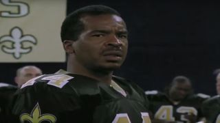 David Alan Grier in a Saints jersey in A Saintly Switch