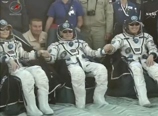 NASA astronaut Peggy Whitson (left), Russian cosmonaut Fyodor Yurchikhin (center) and NASA astronaut Jack Fischer (right) pose for a photo after landing in Kazakhstan on Sept. 3, 2017 local time (late Sept. 2, EDT). Whitson spent 288 days on the space station during her flight, with Fischer and Yurchikhin spending 136 days on their mission.