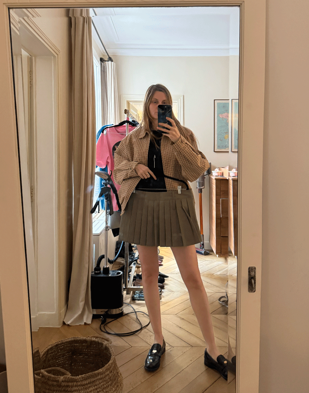French creative and write Eugenie Trochu poses for multiple mirror selfies wearing chic outfits.