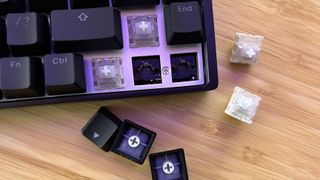 Arrow keys of Endgame Gear keyboard with keycaps and switches removed