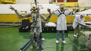 Russia's space agency Roscosmos shows off the humanoid robt Skybot F-850 during tests on July 28, 2019 ahead of its launch on a Soyuz MS-14 spacecraft.