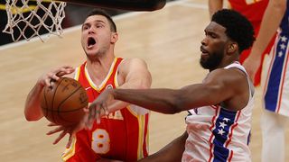 Joel Embiid #21 of the Philadelphia 76ers strips the ball from Danilo Gallinari #8 of the Atlanta Hawks during the second half of game 3 of the Eastern Conference Semifinals at State Farm Arena on June 11, 2021 in Atlanta, Georgia.