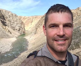 Jeremy Hansen at the Tunnunik impact crater in the Arctic.