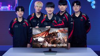 Samsung Odyssey OLED G8 with T1 League of Legends team standing in backdrop