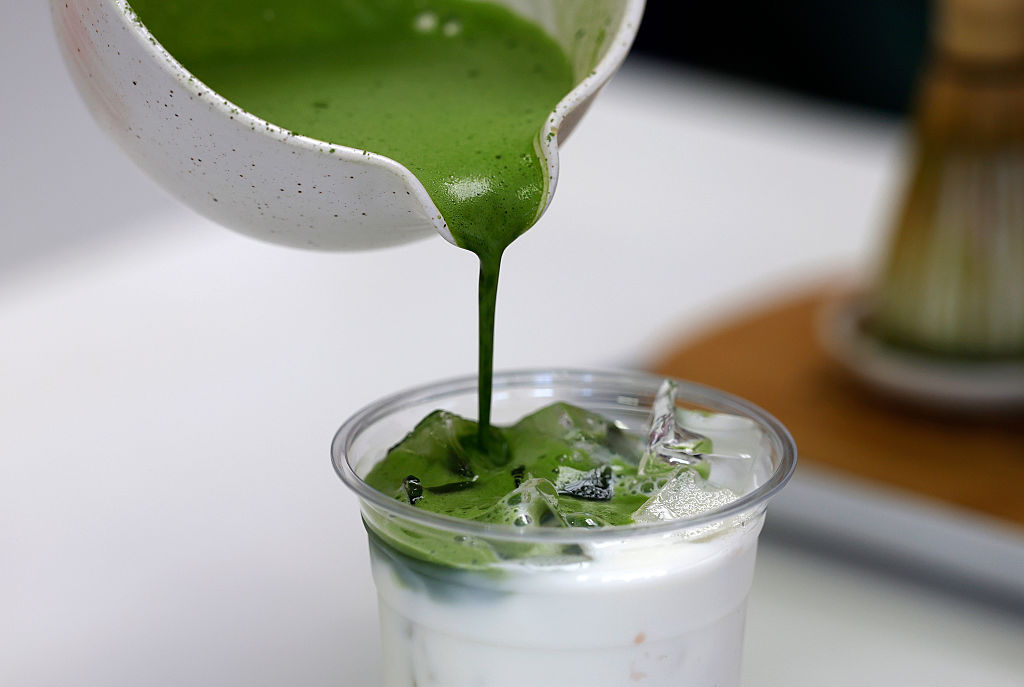 BERKELEY, CALIFORNIA - JULY 15: A matcha drink is made at Third Culture on July 15, 2025 in Berkeley, California. A recent surge in matcha's popularity has led to a global matcha shortage, driven by soaring demand and limited production in Japan, where high-quality matcha is grown. The labor-intensive harvesting and processing methods of matcha, along with a decline in the number of Japanese tea farmers, have further exacerbated the shortage. (Photo by Justin Sullivan/Getty Images)