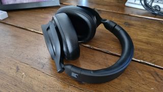 The Heavys H1H headphones on a wooden desk