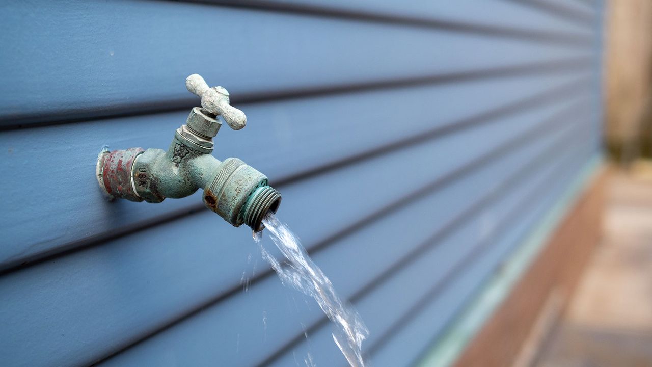 water flowing from an outdoor faucet