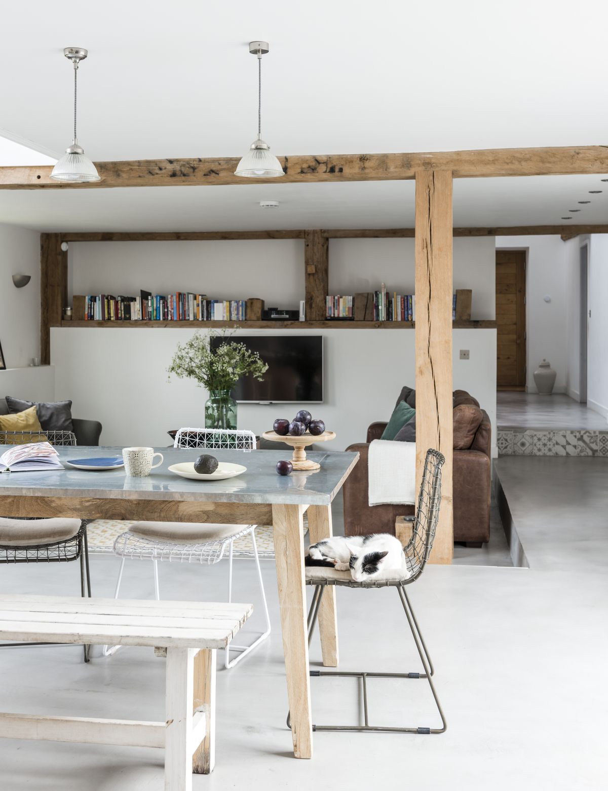 dining room and living room with polished concrete floor