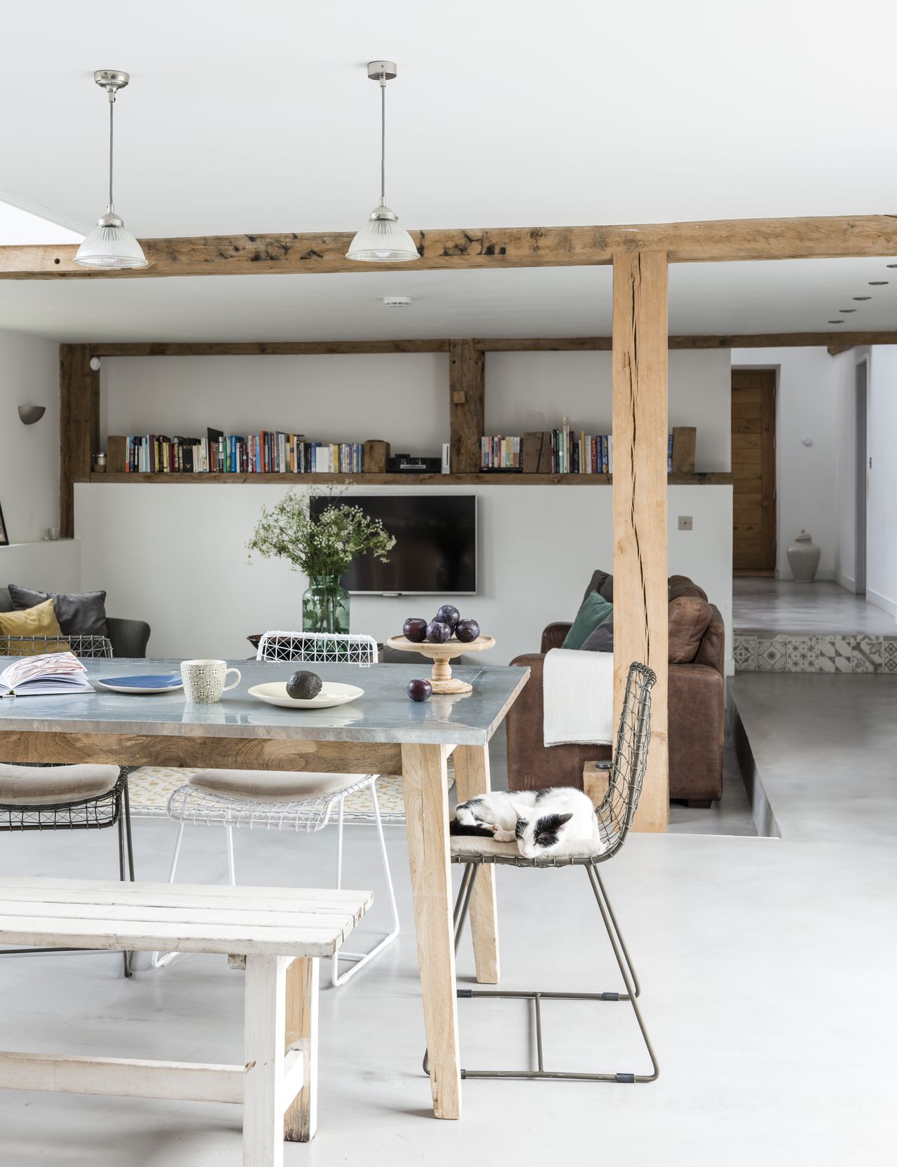 dining room and living room with polished concrete floor