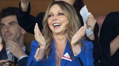 Carol Vorderman claps and smiles at Royal Ascot, 2025