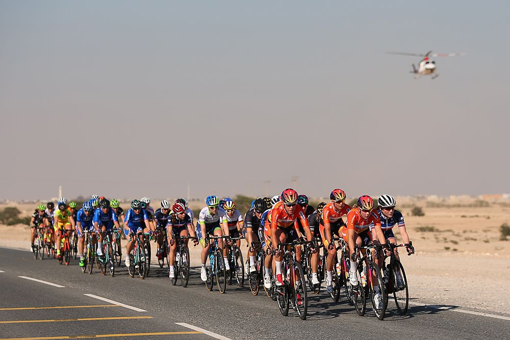 Ladies Tour of Qatar stage 1 peloton riding in the heat