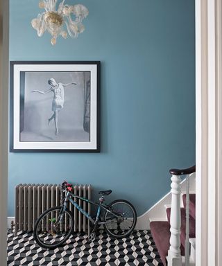 hallway paint ideas blue wall with black and white tiles