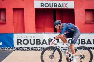 Pithie arrives at the Roubaix velodrome to take seventh, bloodied from his late crash