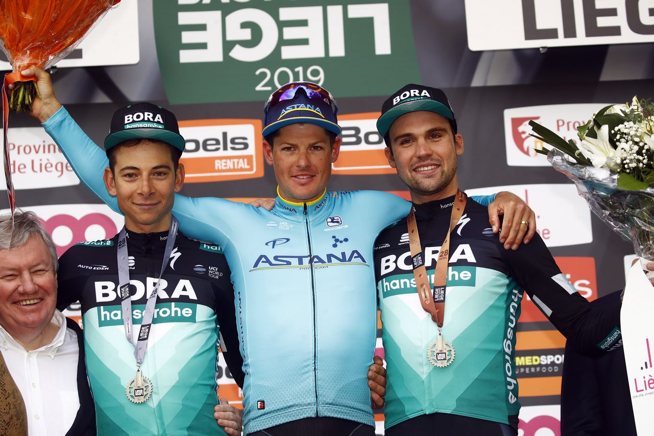 The final podium: Formolo in second, Fuglsang the winner and Schachmann in third (L-R)