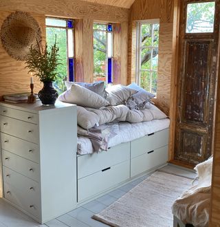 Tiny home with DIY built in bed