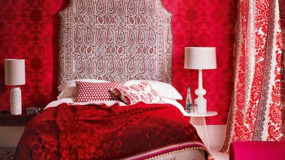 Red painted bedroom with scarlet accessories