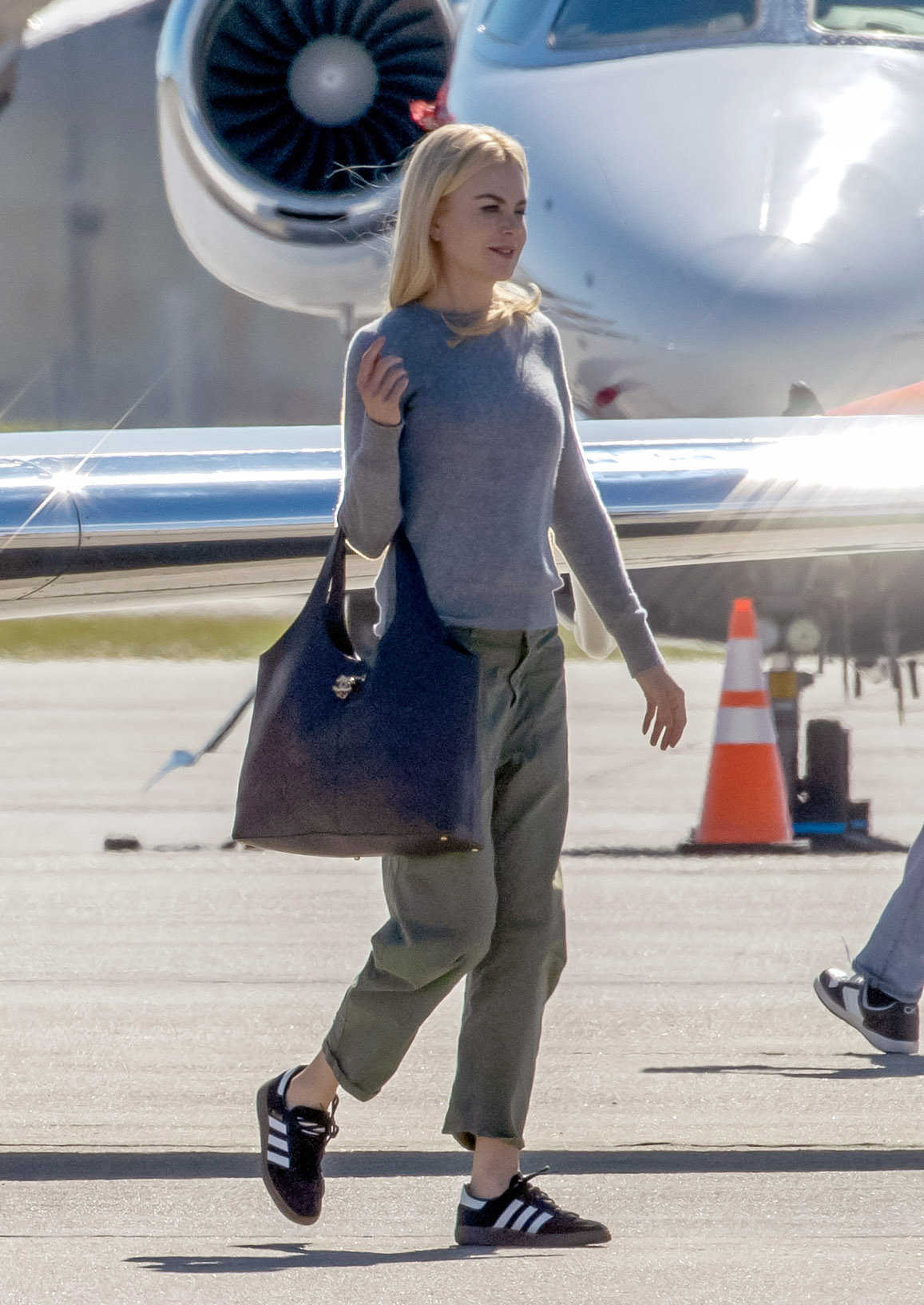Nicole Kidman was spotted outside the airport wearing cargo pants and Adidas Sambas sneakers