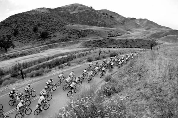 The peloton passes through some rolling hills in California.