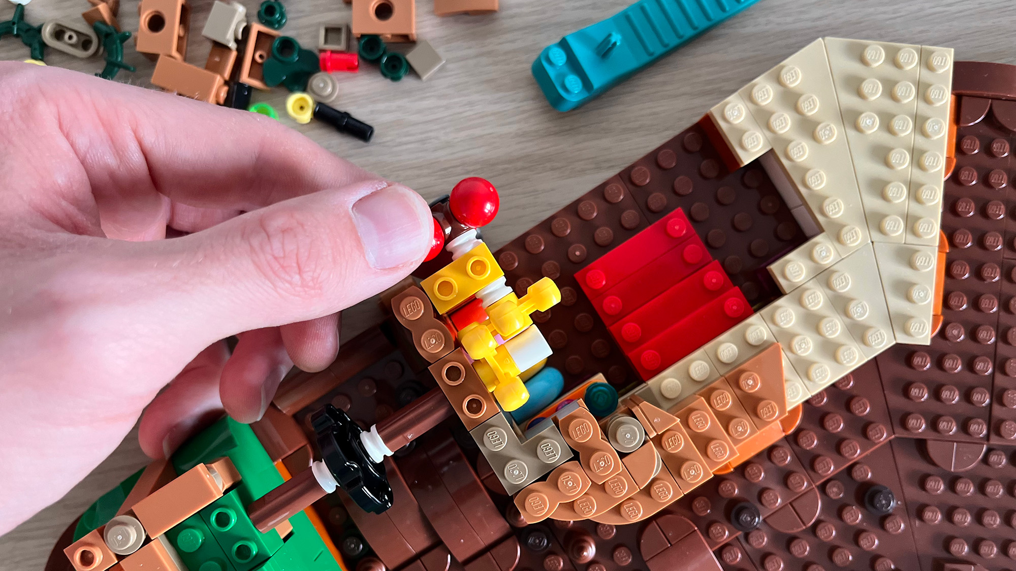 Lego Willy Wonka & the Chocolate Factory set, hand building the chocolate waterfall mechanism