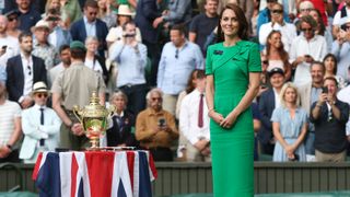 Catherine, Princess of Wales waits to present the trophy to winner Carlos Alcaraz during day fourteen of The Championships Wimbledon 2023