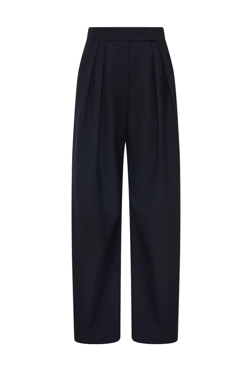 An image of navy blue trousers from Henne.