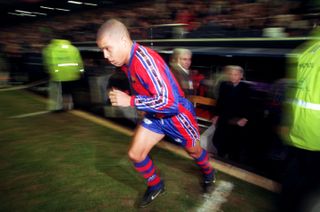 Bobby Robson, Manager of F. C. Barcelona watches Ronaldo take the field