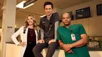 Sarah Chalke, Zach Braff, and Donald Faison posing for the Scrubs reboot.