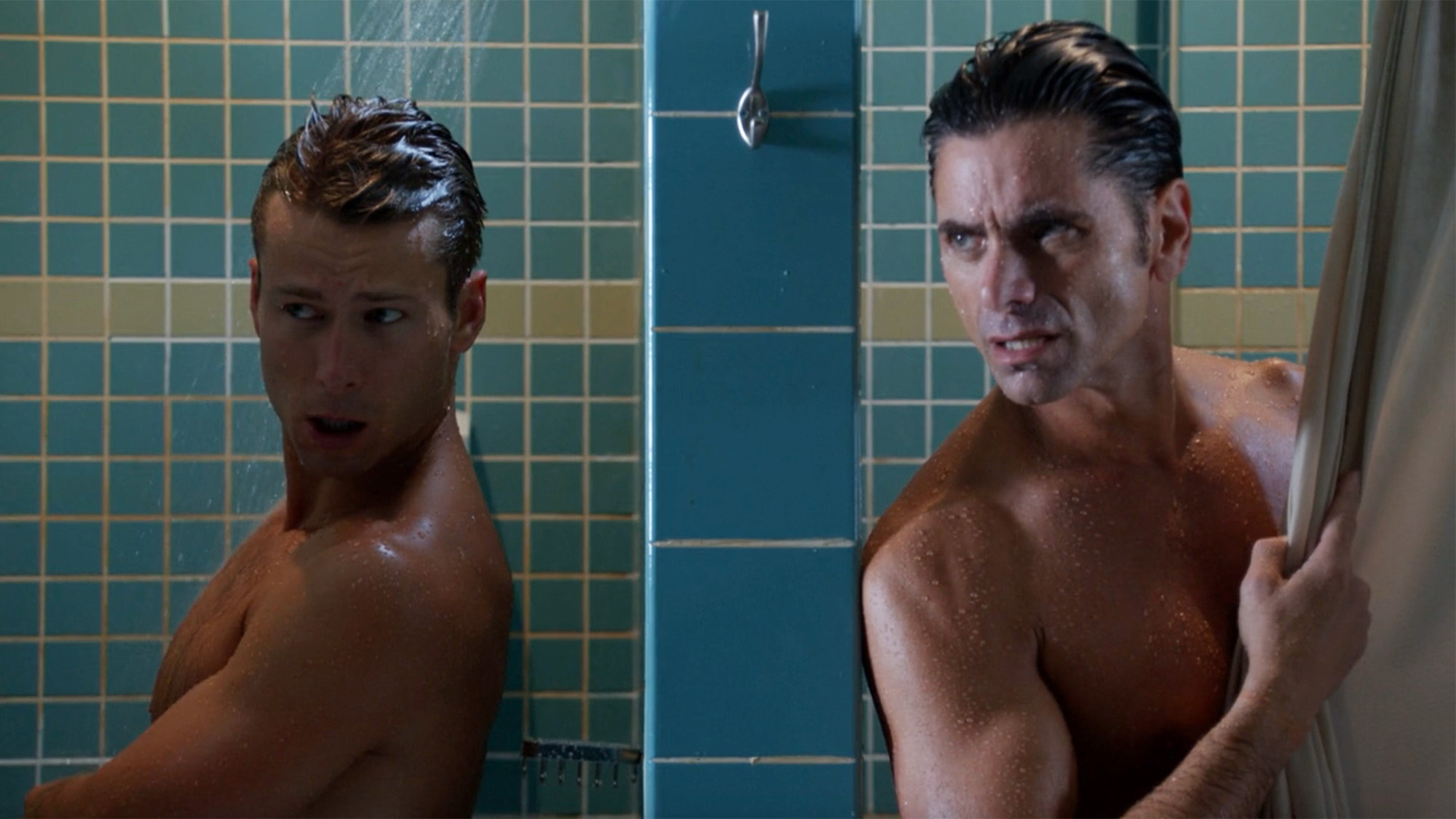 Glen Powell and John Stamos talk in famous shower scene in Scream Queens.